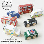 Zestaw 7 drewnianych samochodzików Le Toy Van z Londynu: czerwony piętrowy autobus, czarna taksówka, wóz strażacki, furgonetka policji, karetka pogotowia, mini i auto sportowe. Ekologiczne zabawki dla dzieci z drewna FSC z innowacyjnymi drewnianymi kołami.
