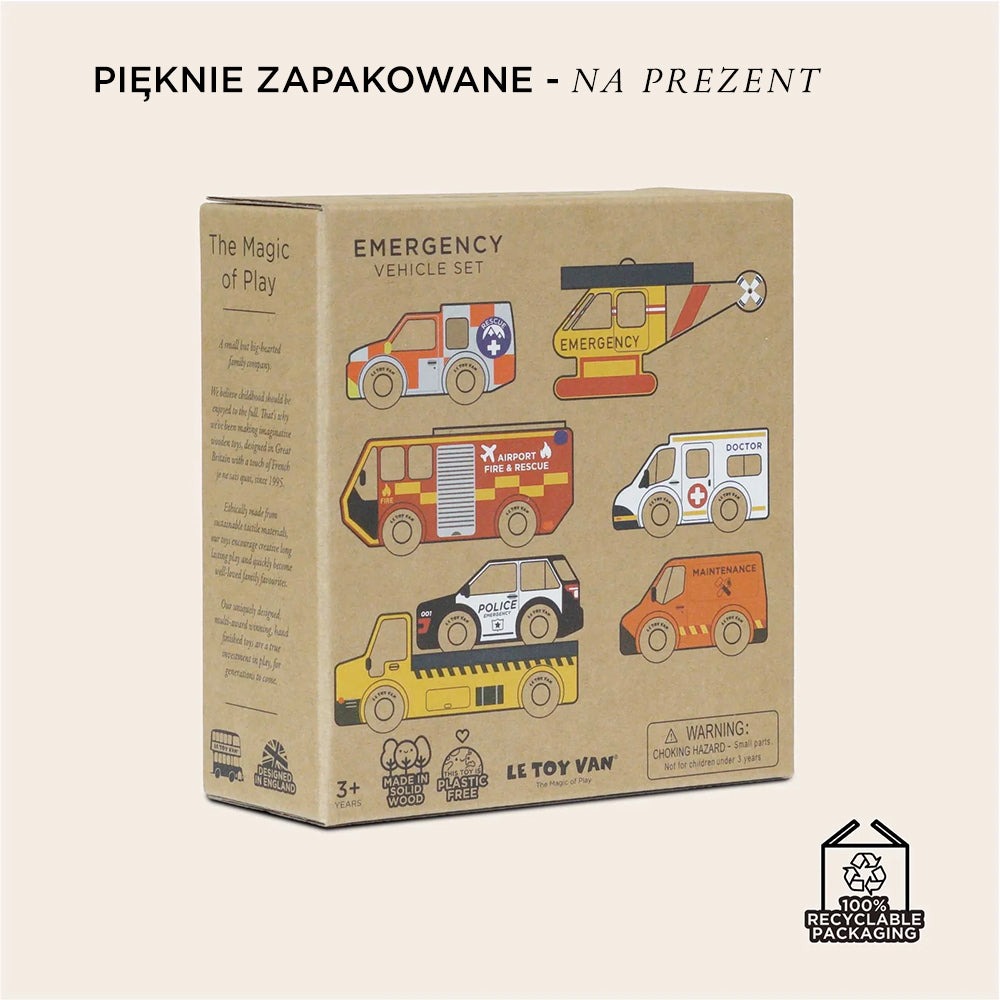 Pięknie zapakowane pudełko z zestawem Drewniane służby ratunkowe dla dzieci. Widać ilustracje 7 pojazdów: helikoptera, wozu strażackiego, karetki, policji. Zabawki z drewna FSC®.