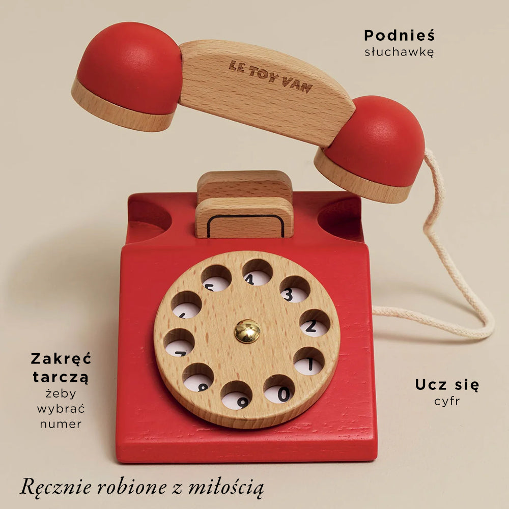 Drewniany telefon vintage Le Toy Van, czerwony, z realistyczną obrotową tarczą do nauki cyfr.