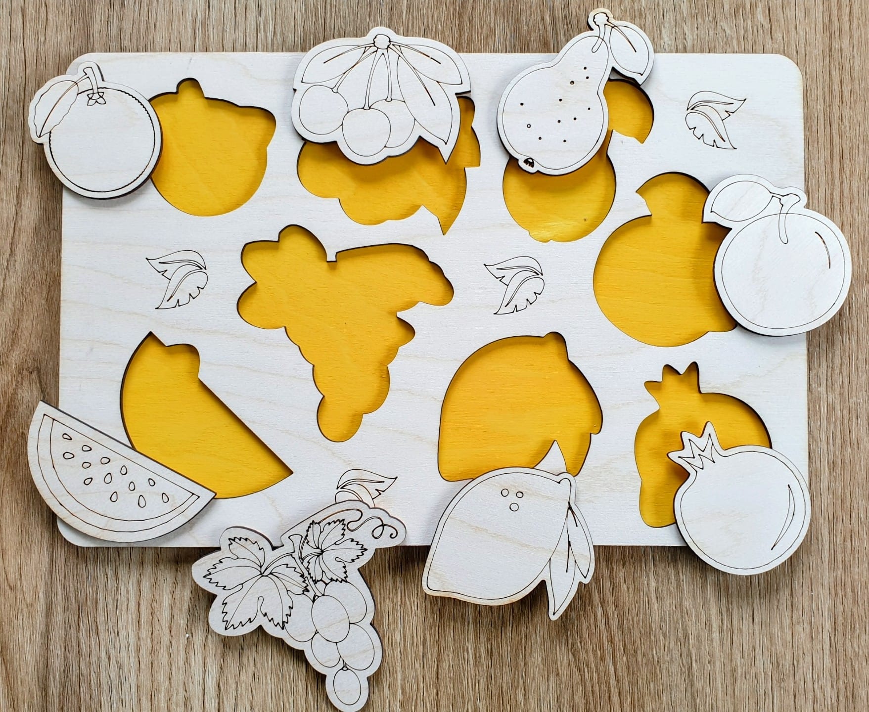 Drewniana układanka edukacyjna owoce żółte