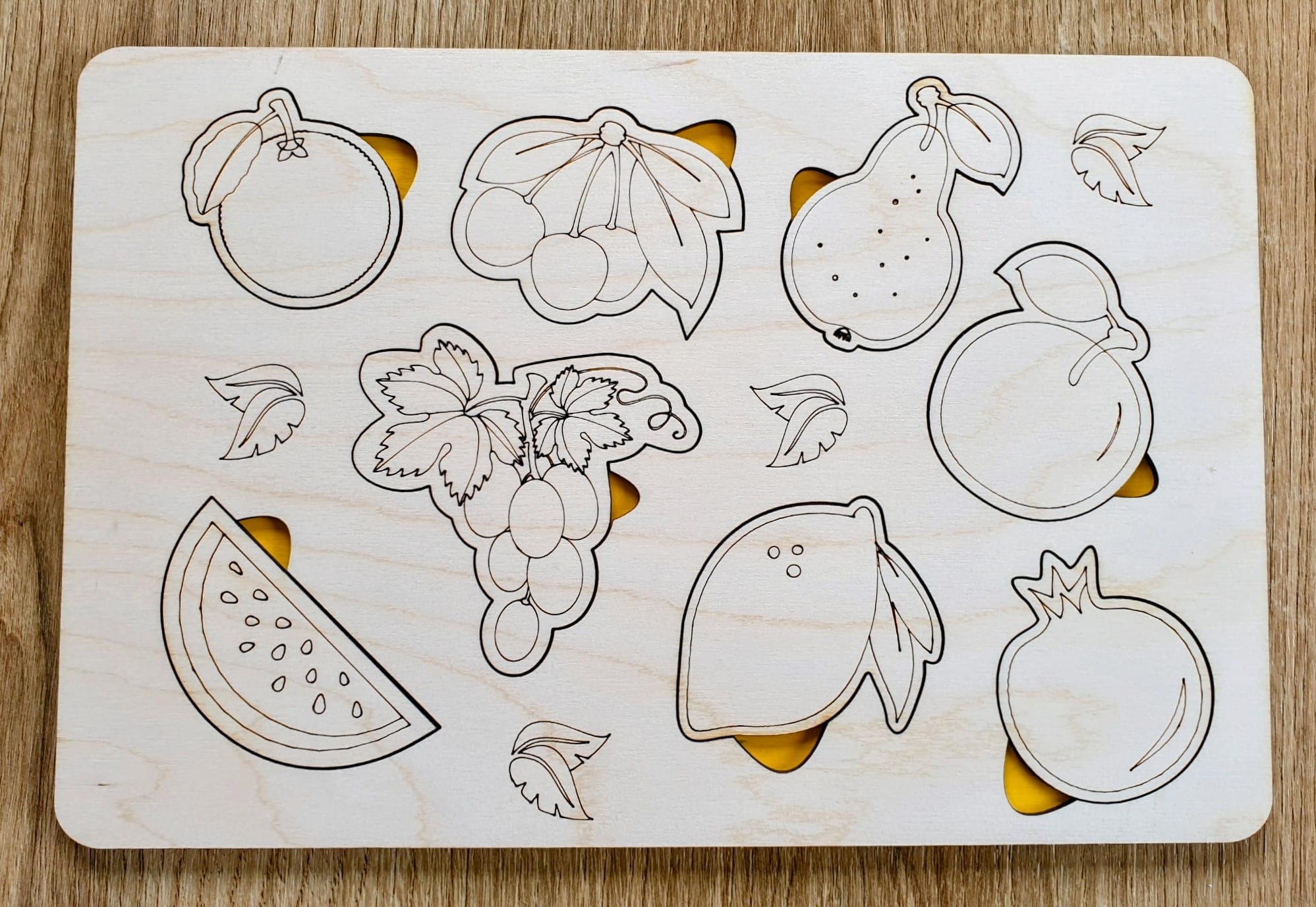 Drewniana układanka edukacyjna owoce żółte