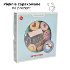 Drewniane ciasteczka zestaw Le Toy Van Honeybake w pięknym opakowaniu prezentowym z widocznymi, pastelowymi ciastkami.