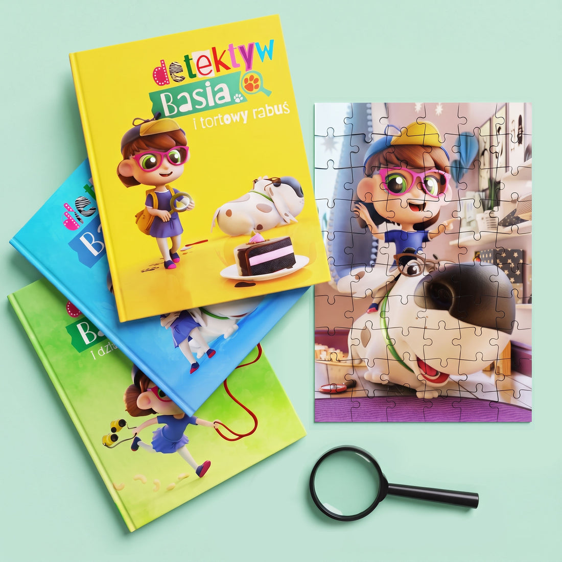 Full Detektyw Basia set: three hardback books fanned out, a finished 60-piece puzzle and a magnifying glass.