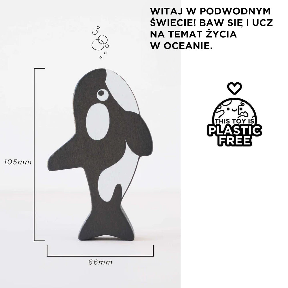 Drewniana figurka orki, część edukacyjnej układanki rybki dla dzieci. Bezplastikowa zabawka o wymiarach 105x66mm, idealna do poznawania życia w oceanie.